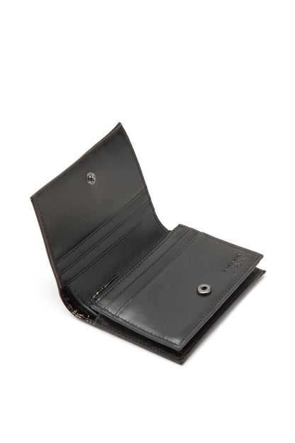 熱賣！Diesel 1DR 漆皮雙折短夾